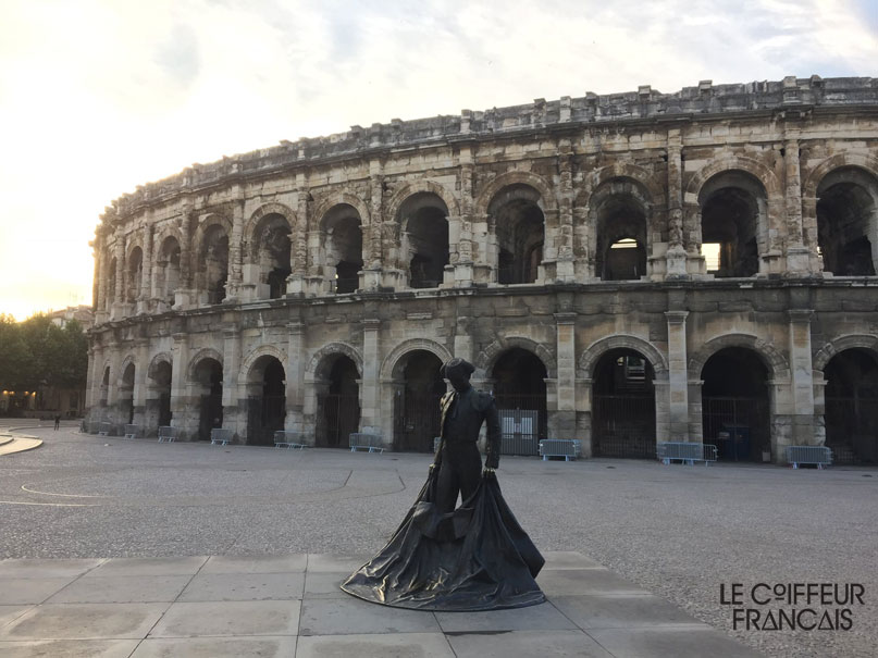 Les arènes de Nimes vu du salon de coiffure le Coiffeur Français